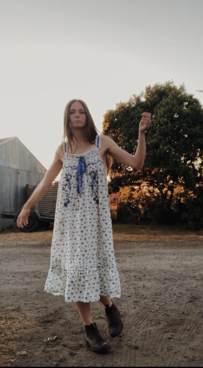 100% RECYCLED COTTON - NIGHTINGALE HAND SMOCKED MIDI DRESS BLUE ROSE FLORAL