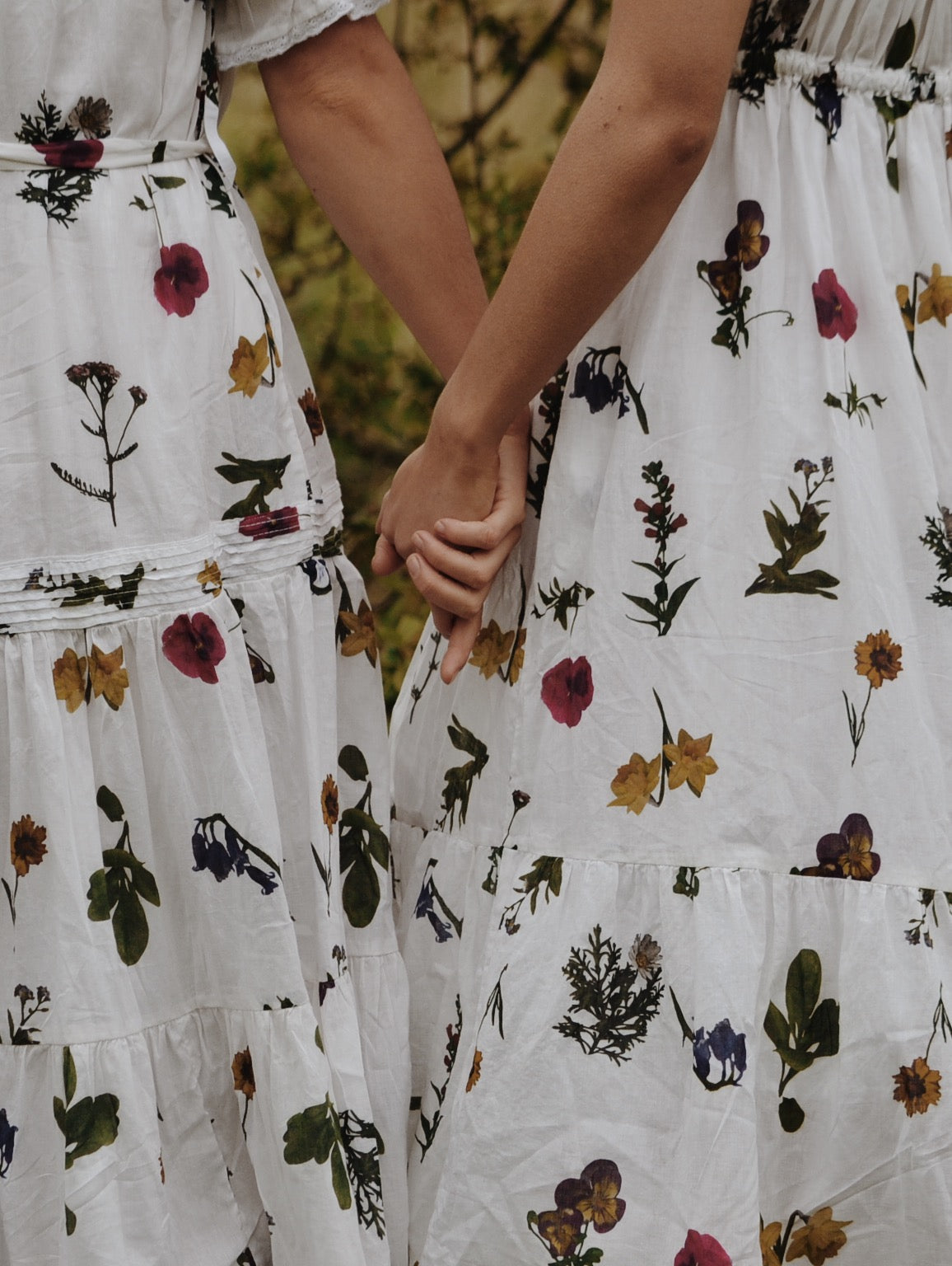 PRELOVED - 100% RECYCLED COTTON - MORNING SONG HAND SMOCKED TIERED DRESS - GARDEN BOTANIC XL